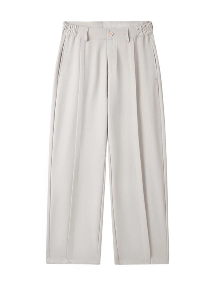 Teo - Wide-Leg Pleated Trousers